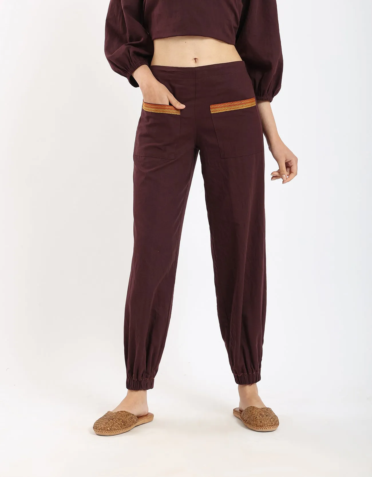 Cotton pants with two patch pockets with embroidery.